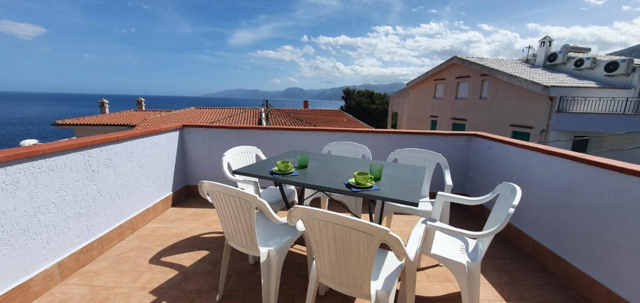 Appartamento Terrazza Vista Mare Кала-Гононе Экстерьер фото